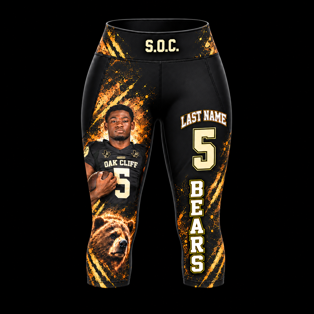 Front of custom capri tights with a black-and-gold South Oak Cliff athlete photo design on a black background
