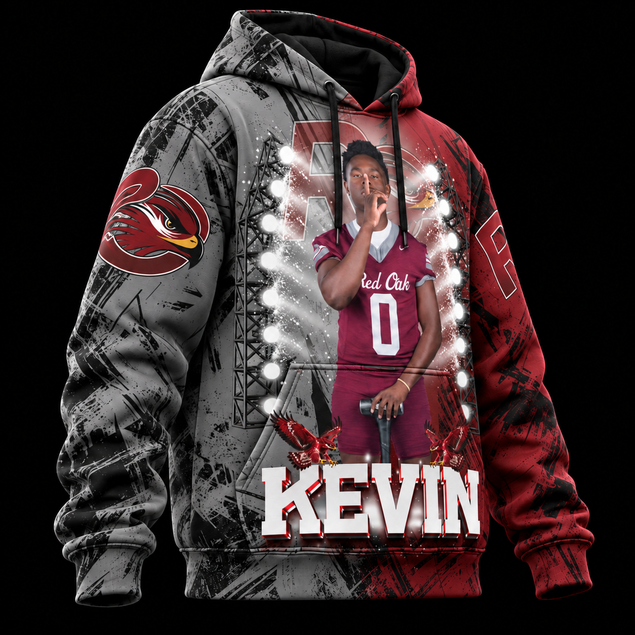 Side view of the custom heavyweight 3D hoodie with red-and-gray KEVIN Red Oak football artwork covering the hood, body, and sleeve on a black background.